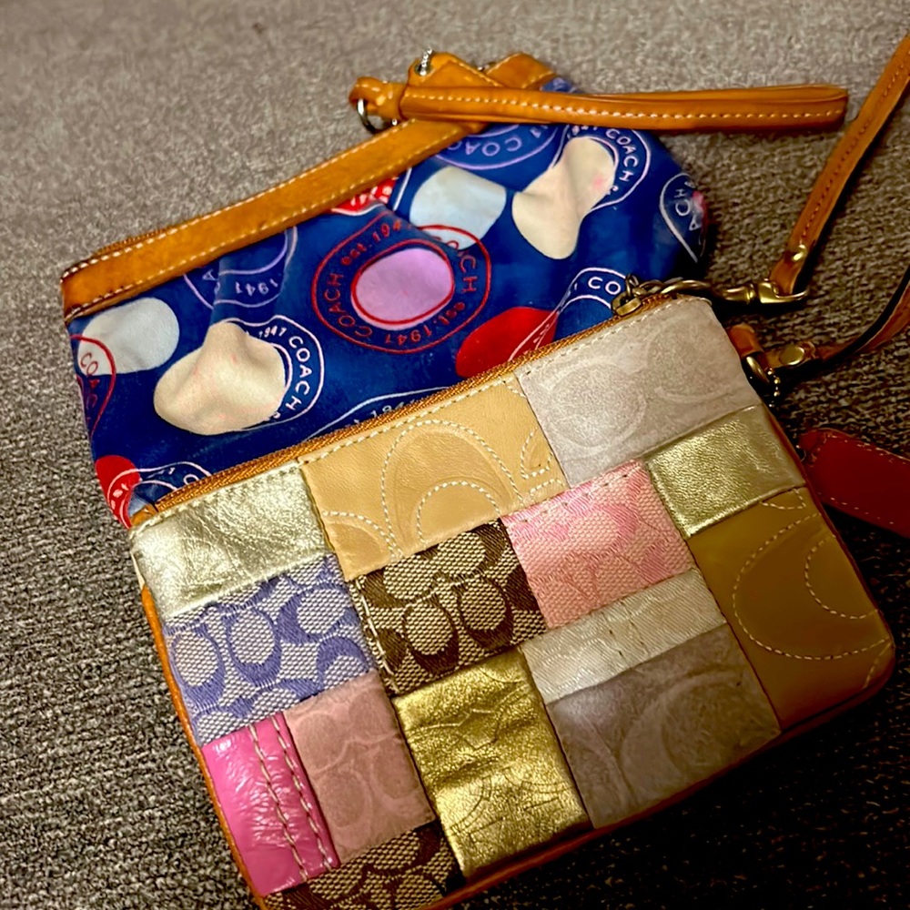 Two Coach wristlets